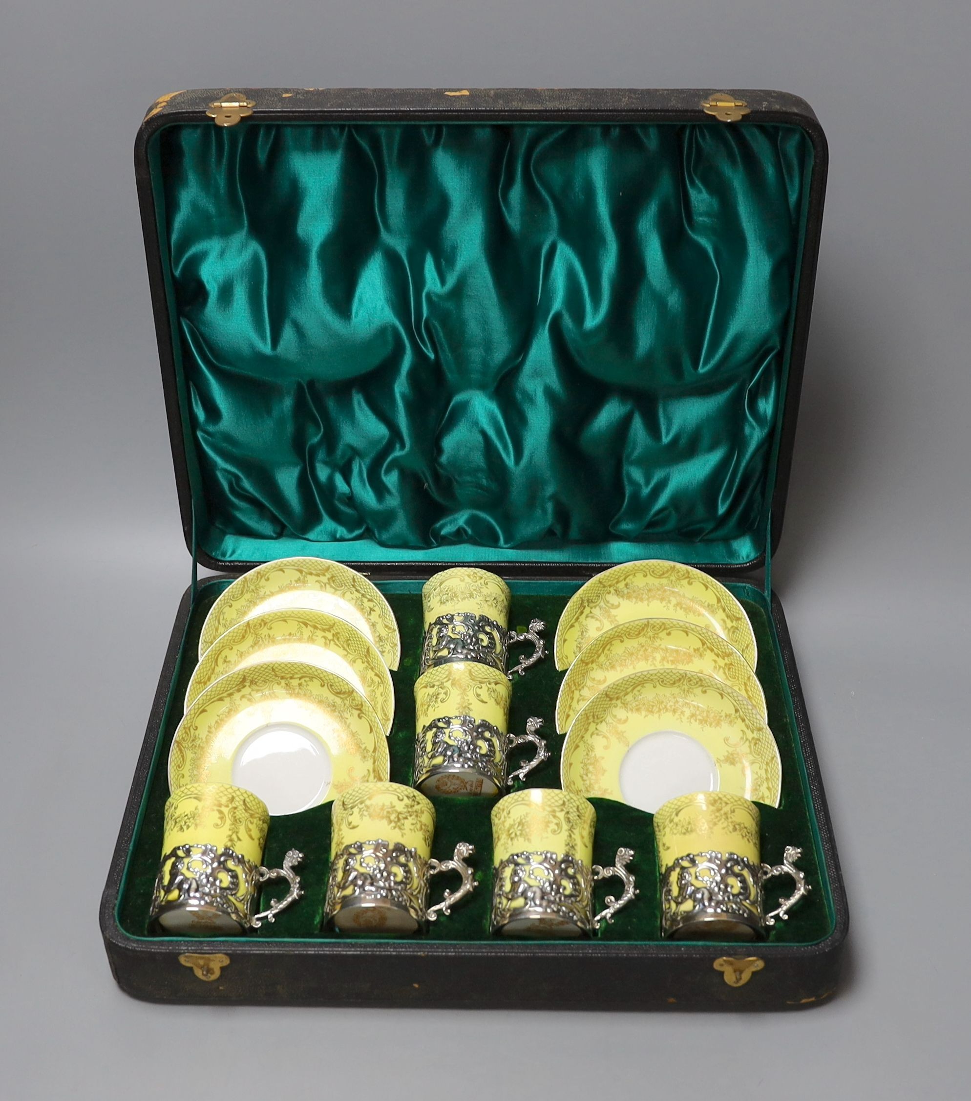 A cased Staffordshire Eggshell silver-mounted coffee set